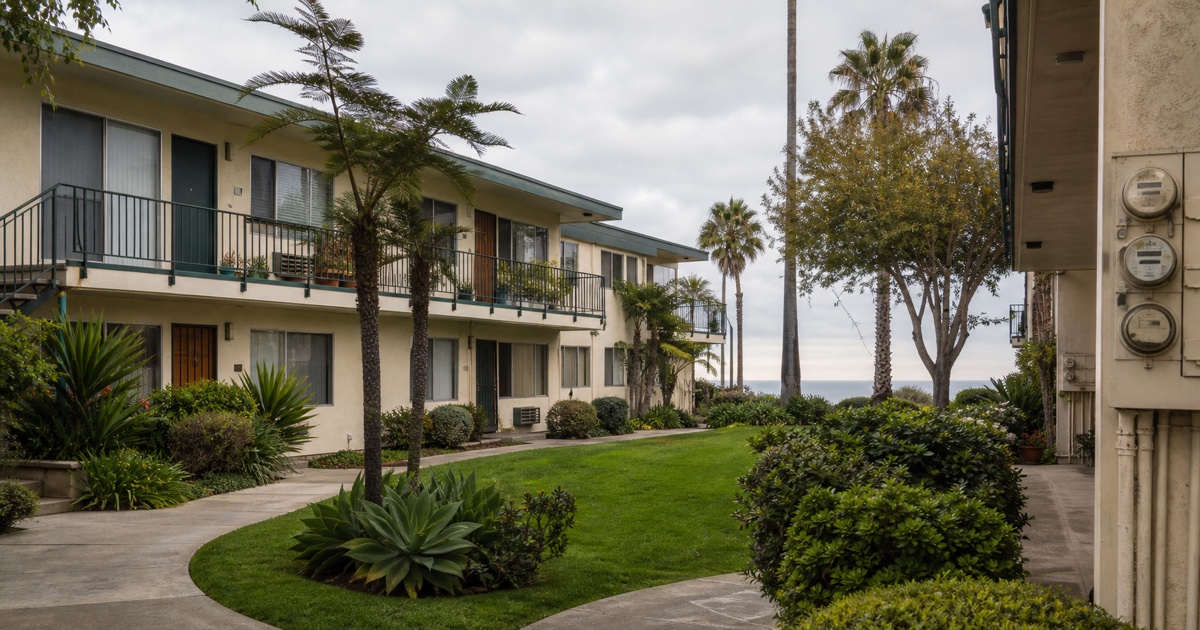 California courtyard rental showing varied building age, shared spaces, utilities, and landscaping.