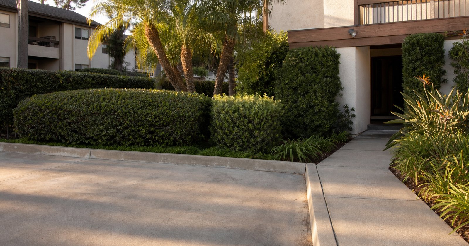 Short, unobstructed route from a shaded parking bay to a California apartment entrance