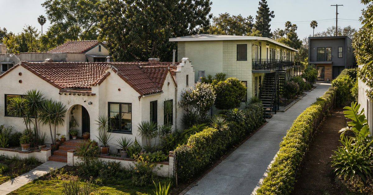 Los Angeles parcel with a Spanish duplex, rear multifamily building, and newer accessory dwelling unit
