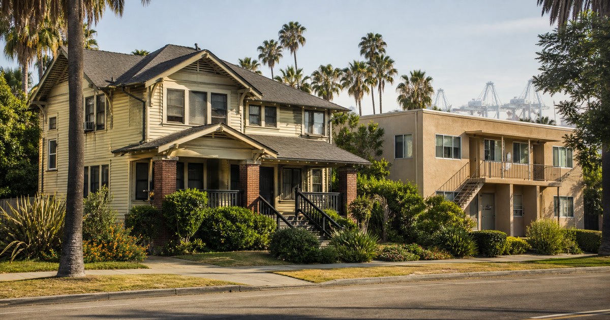 Long Beach Craftsman fourplex and small apartment building with distant port cranes